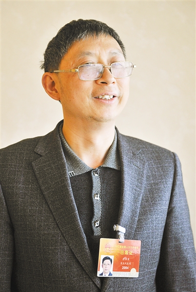 全國人大代表唐洪軍。